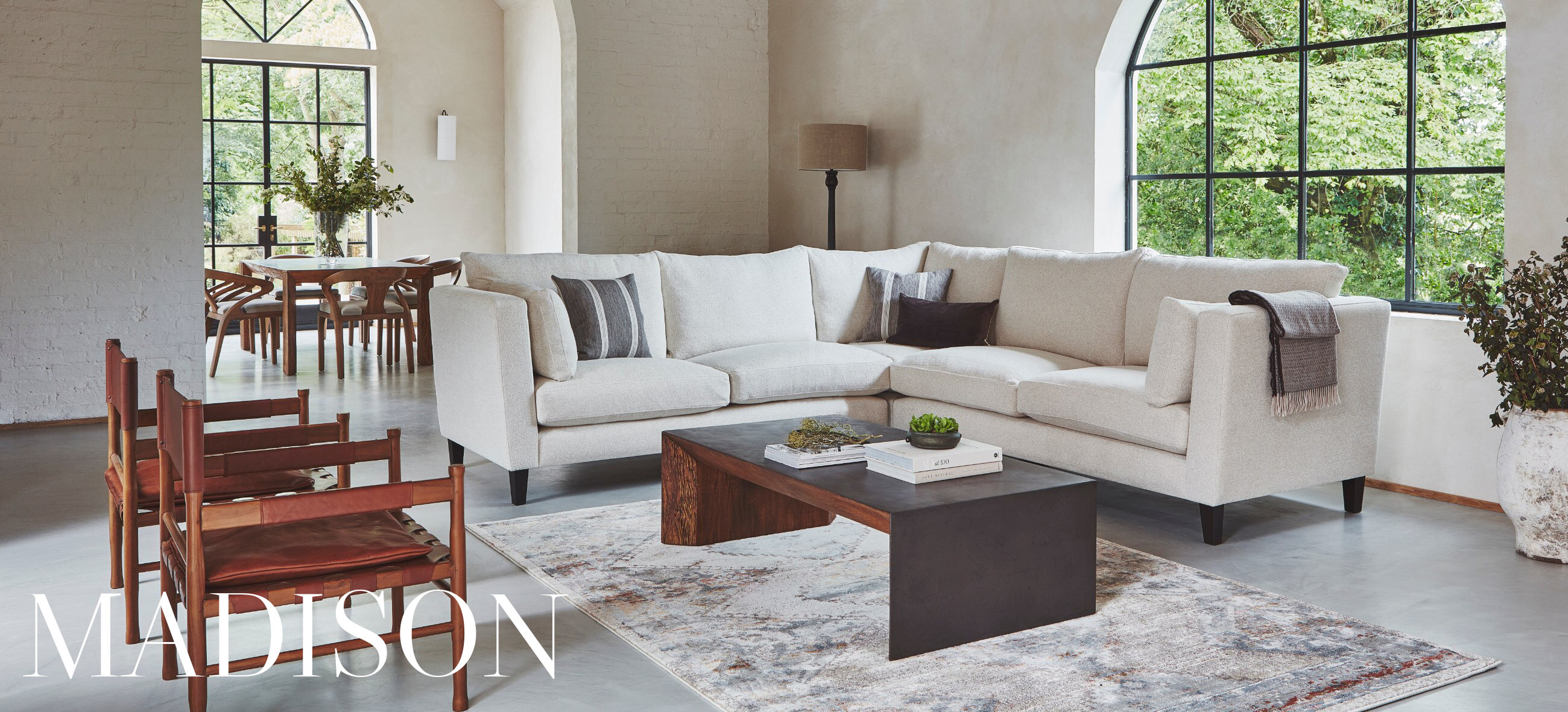 High Back, Side Cushions, Elevated on Slim legs 
