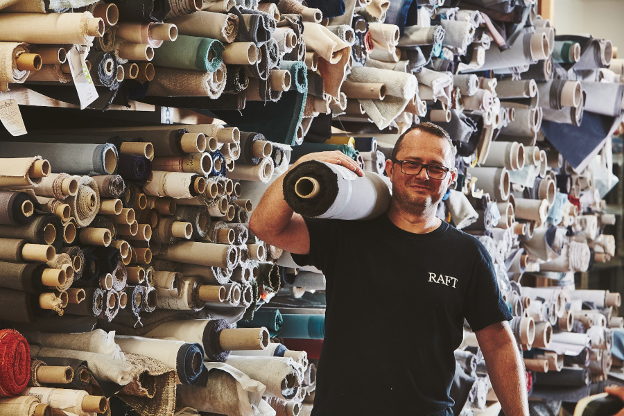Arek, our fabric cutter, at the London workshop